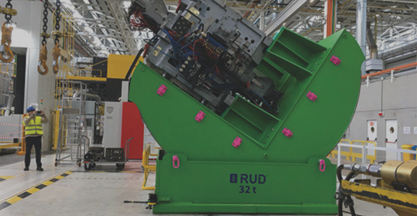 Machine tool mover improving safety during equipment handling in manufacturing plant banner